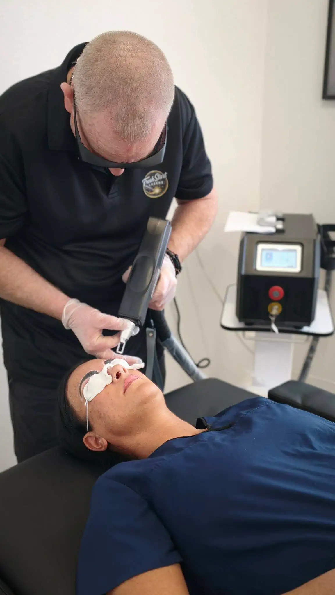 Close-up of eyebrow area during cosmetic tattoo removal treatment